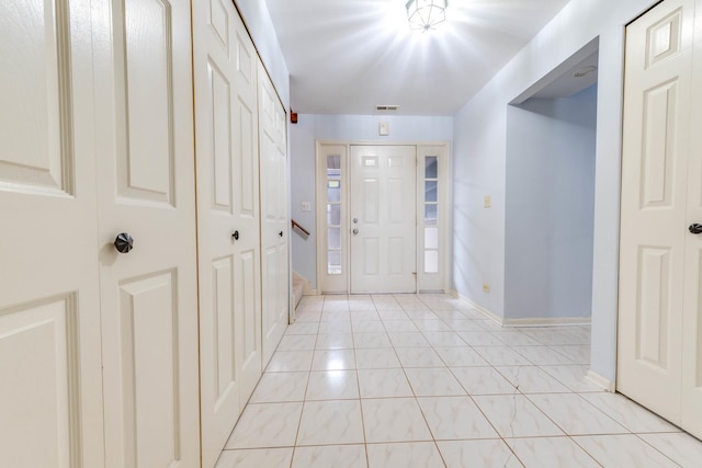 26 Prairie Dr, Westmont, IL 60559 - entrance foyer with baseboards, light tile patterned floors, and visible vents