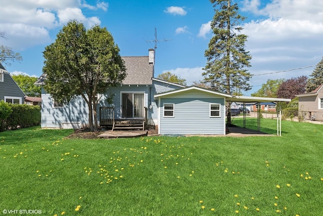 519 Catalpa Dr, Round Lake, IL 60073 - back of property with a chimney and roof with shingles