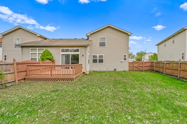 rear view of property with a deck