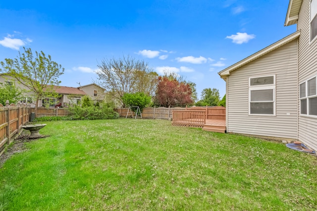 view of yard with a deck