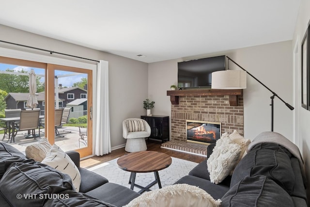 690 Queenswood Ln, Wheaton, IL 60189 - living room with wood finished floors, a fireplace, and baseboards