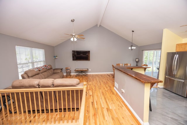 1012 Belden Way, Joliet, IL 60435 - living area featuring ceiling fan, beamed ceiling, light wood-style floors, and high vaulted ceiling