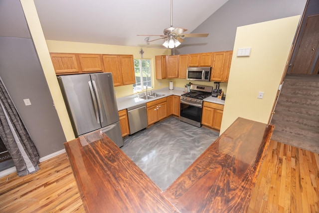 1012 Belden Way, Joliet, IL 60435 - kitchen featuring stainless steel appliances, ceiling fan, a sink, high vaulted ceiling, and light wood-type flooring
