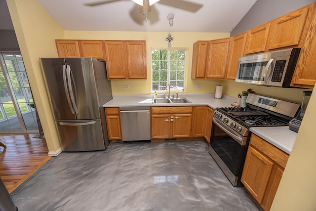 1012 Belden Way, Joliet, IL 60435 - kitchen with stainless steel appliances, a sink, vaulted ceiling, a ceiling fan, and light countertops