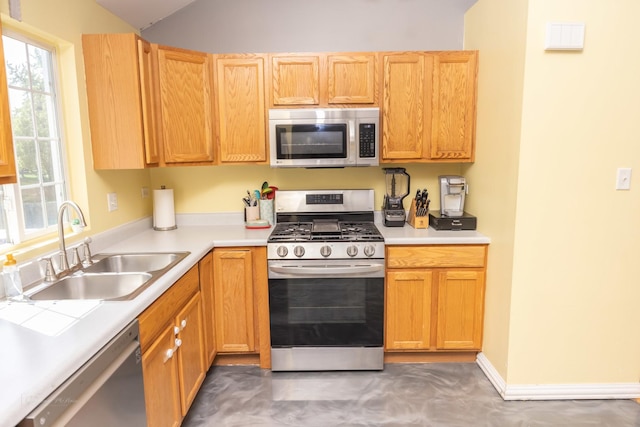 1012 Belden Way, Joliet, IL 60435 - kitchen with stainless steel appliances, a sink, light countertops, and lofted ceiling
