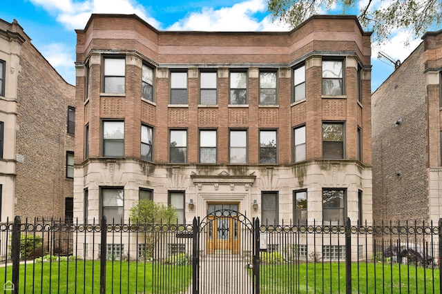 view of property featuring a fenced front yard