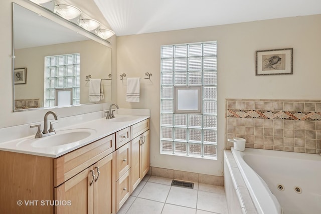 6927 N Oleander Ave, Chicago, IL 60631 - bathroom featuring a whirlpool tub, tile patterned floors, and double vanity