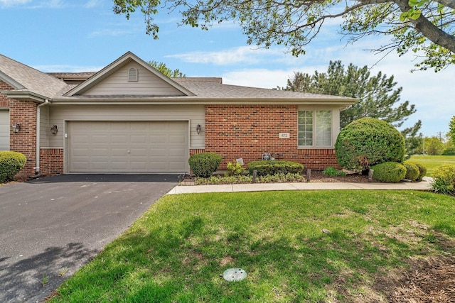 472 Linden Cir, Beecher, IL 60401 - view of front facade with brick siding, driveway, a front lawn, an attached garage, and a shingled roof