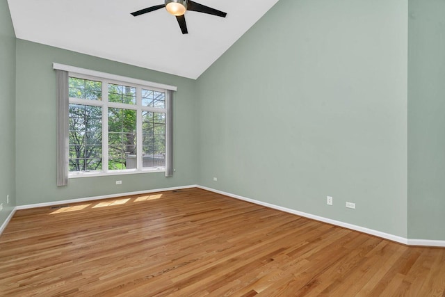 472 Linden Cir, Beecher, IL 60401 - empty room featuring lofted ceiling, ceiling fan, baseboards, and light wood-style flooring