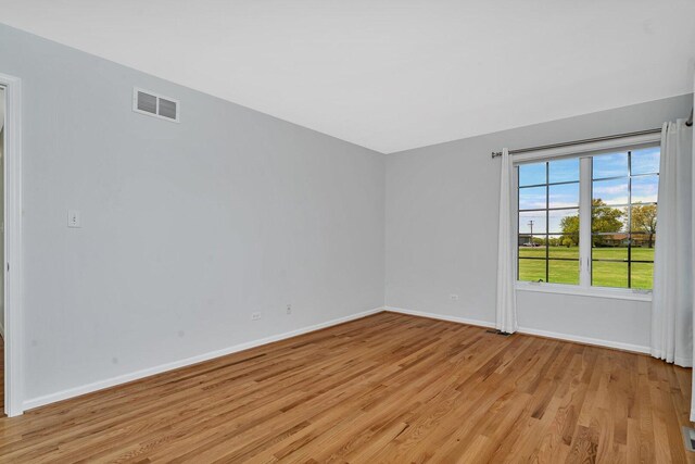 472 Linden Cir, Beecher, IL 60401 - unfurnished room with light wood-style floors and baseboards