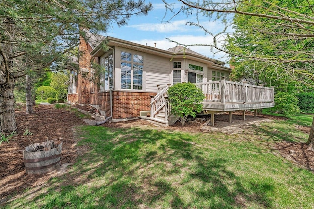 472 Linden Cir, Beecher, IL 60401 - back of house featuring a deck, brick siding, and a lawn