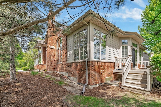 472 Linden Cir, Beecher, IL 60401 - view of side of home featuring brick siding, a wooden deck, and stairway