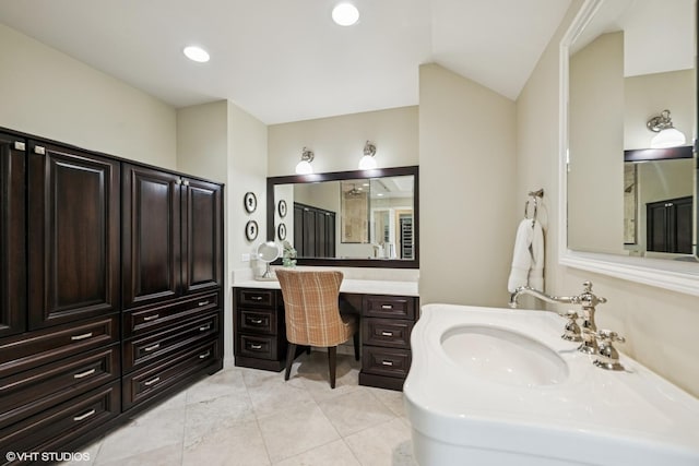 full bath with vaulted ceiling and recessed lighting
