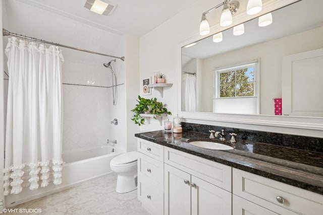 full bathroom with toilet, vanity, and shower / bath combination with curtain