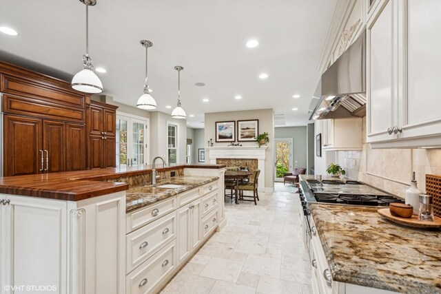 3324 Lakeside Ave, Northbrook, IL 60062 - kitchen featuring a sink, range, decorative backsplash, recessed lighting, and under cabinet range hood