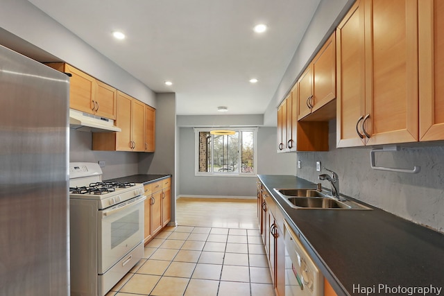 1132 E Randville Dr Unit 2E, Palatine, IL 60074 - kitchen with white appliances, under cabinet range hood, a sink, light tile patterned floors, and recessed lighting