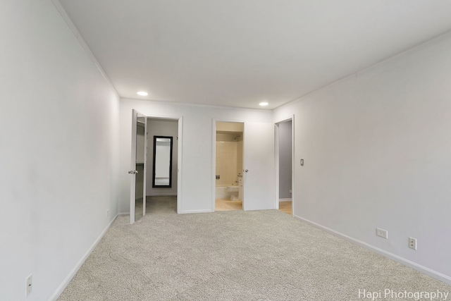1132 E Randville Dr Unit 2E, Palatine, IL 60074 - unfurnished bedroom with light colored carpet, baseboards, recessed lighting, ensuite bath, and ornamental molding