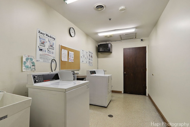1132 E Randville Dr Unit 2E, Palatine, IL 60074 - community laundry room featuring washing machine and clothes dryer and baseboards