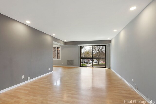 1132 E Randville Dr Unit 2E, Palatine, IL 60074 - unfurnished room with light wood-style floors, recessed lighting, and baseboards