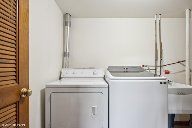 laundry area featuring independent washer and dryer