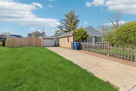 2104 S River Rd, Des Plaines, IL 60018 - view of front of house featuring driveway and an attached garage