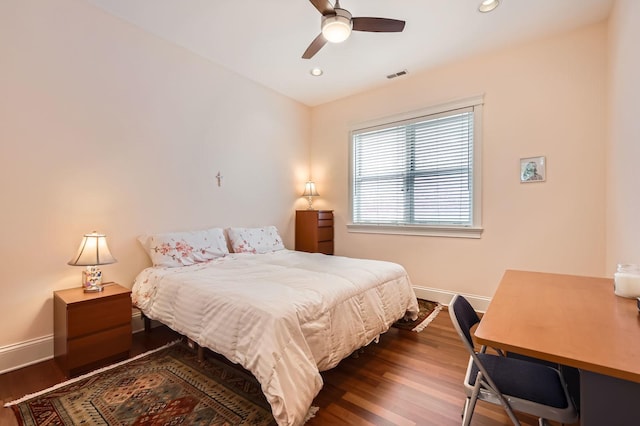 bedroom featuring baseboards, wood finished floors, recessed lighting, and ceiling fan