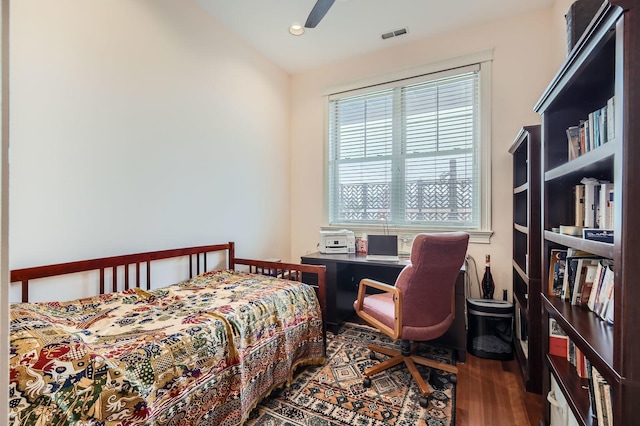 bedroom with wood finished floors, recessed lighting, and a ceiling fan