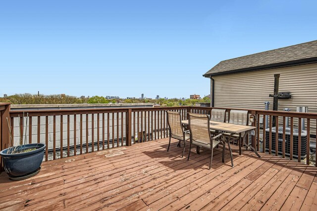 deck with outdoor dining space