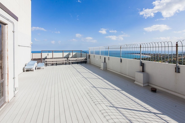 5455 N Sheridan Rd Unit 2915, Chicago, IL 60640 - wooden deck featuring a water view