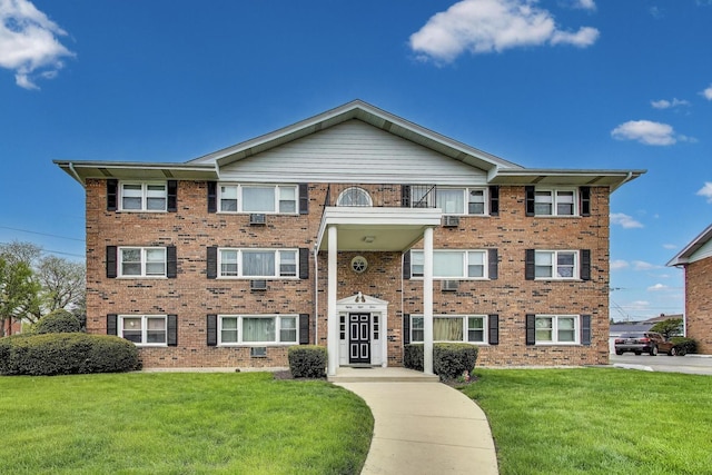 8812 45th Pl Unit 12, Brookfield, IL 60513 - view of front of property featuring a front lawn and brick siding