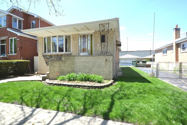 2820 S Shields Ave, Chicago, IL 60616 - view of front of home with brick siding and a gate