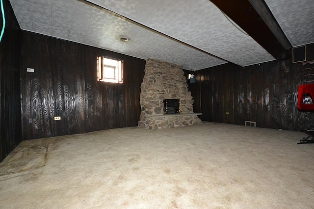 2820 S Shields Ave, Chicago, IL 60616 - basement with wood walls, carpet, and a fireplace