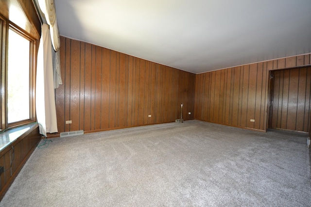 2820 S Shields Ave, Chicago, IL 60616 - empty room featuring light colored carpet and wooden walls