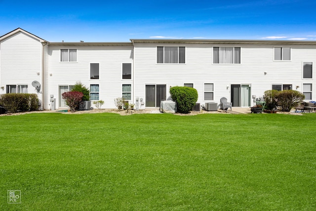 16526 S Nottingham Ct, Lockport, IL 60441 - rear view of house with central AC and a lawn