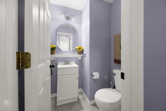 16526 S Nottingham Ct, Lockport, IL 60441 - half bathroom featuring tile patterned flooring, toilet, baseboards, and vanity
