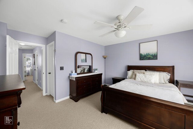 16526 S Nottingham Ct, Lockport, IL 60441 - bedroom featuring ceiling fan, light carpet, and baseboards