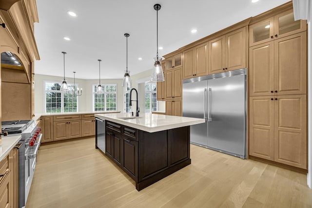 1212 Georgias Way, New Lenox, IL 60451 - kitchen with a sink, light wood-style flooring, high end stove, light countertops, and recessed lighting