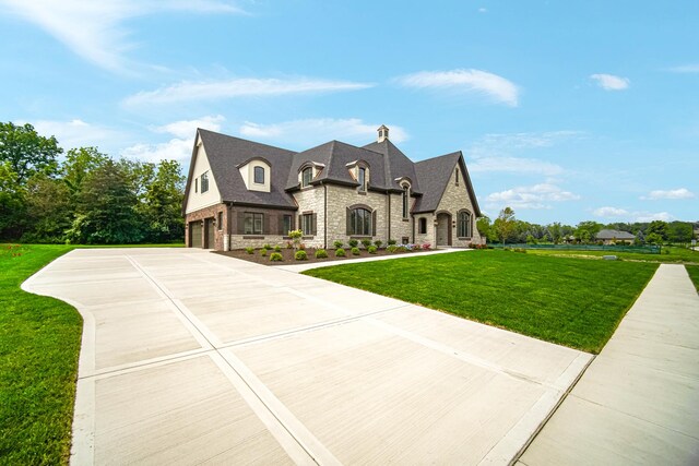 1212 Georgias Way, New Lenox, IL 60451 - view of side of home with an attached garage, a yard, and concrete driveway