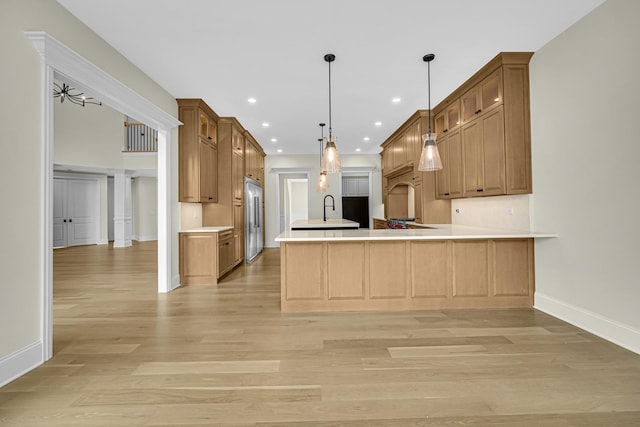 1212 Georgias Way, New Lenox, IL 60451 - kitchen with light wood finished floors, a sink, glass insert cabinets, a center island with sink, and recessed lighting