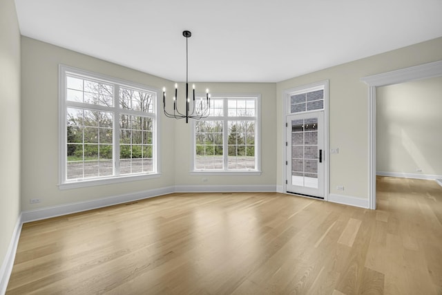 1212 Georgias Way, New Lenox, IL 60451 - kitchen featuring stainless steel built in refrigerator, a sink, baseboards, a peninsula, and light wood finished floors