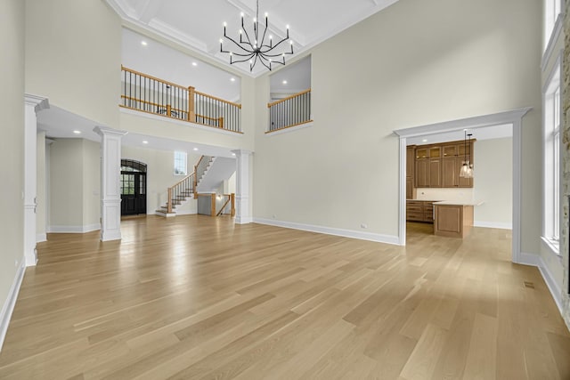 1212 Georgias Way, New Lenox, IL 60451 - unfurnished dining area featuring baseboards, light wood-type flooring, and a chandelier