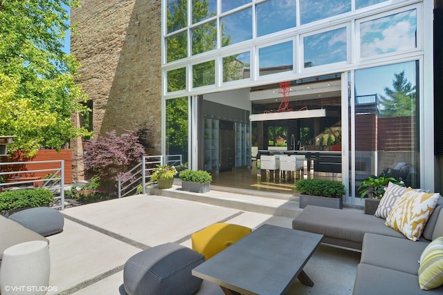 view of patio featuring a sink and an outdoor hangout area