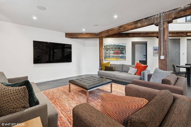 living room with concrete floors, recessed lighting, baseboards, and beam ceiling
