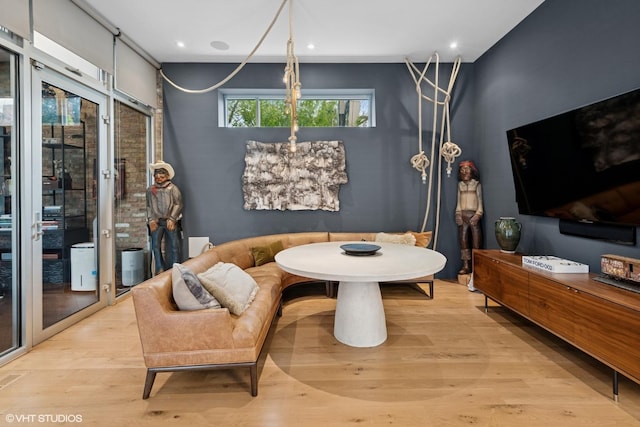 dining area featuring recessed lighting and wood finished floors