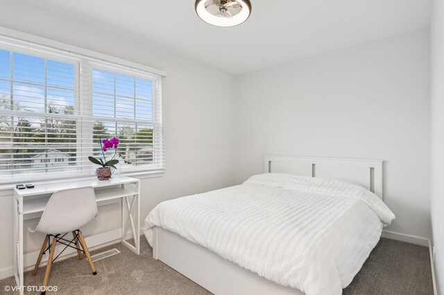 1387 Woodcutter Ln Unit D, Wheaton, IL 60189 - carpeted bedroom with visible vents and baseboards