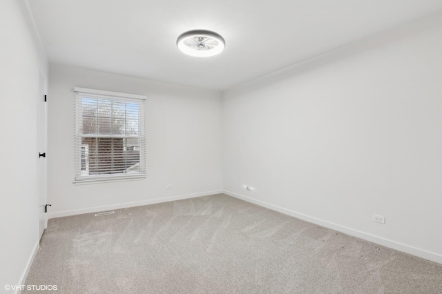 1387 Woodcutter Ln Unit D, Wheaton, IL 60189 - carpeted empty room featuring baseboards