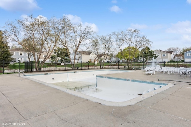 1387 Woodcutter Ln Unit D, Wheaton, IL 60189 - community pool with a patio, a residential view, and fence