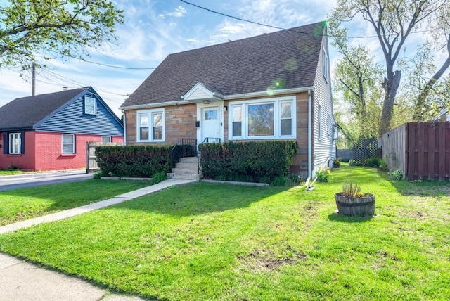 1431 N Hillside Ave, Berkeley, IL 60163 - view of front facade featuring roof with shingles