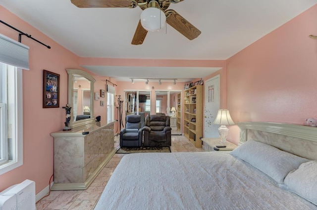 1431 N Hillside Ave, Berkeley, IL 60163 - bedroom featuring track lighting, baseboards, and ceiling fan