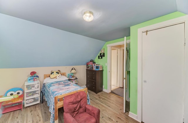 1431 N Hillside Ave, Berkeley, IL 60163 - bedroom with vaulted ceiling, wood finished floors, and baseboards